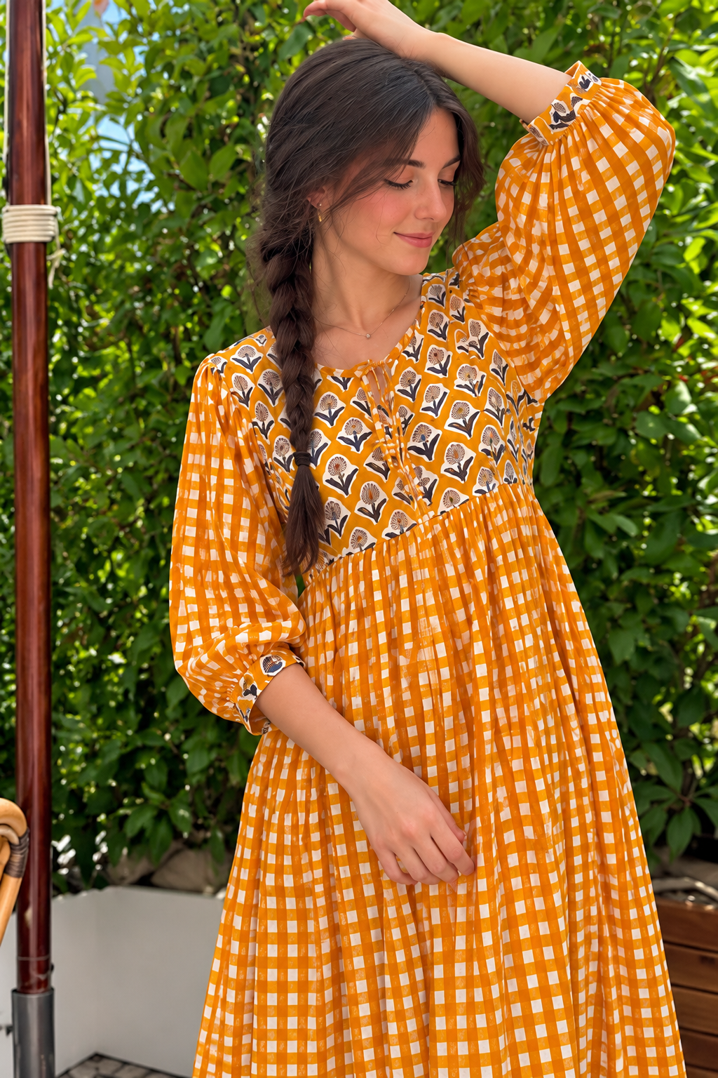 Orange and white checkered dress with decorative printed chest panel