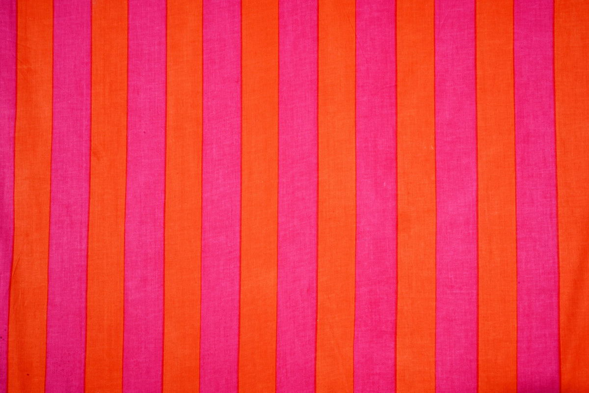 Bright pink orange striped cotton fabric