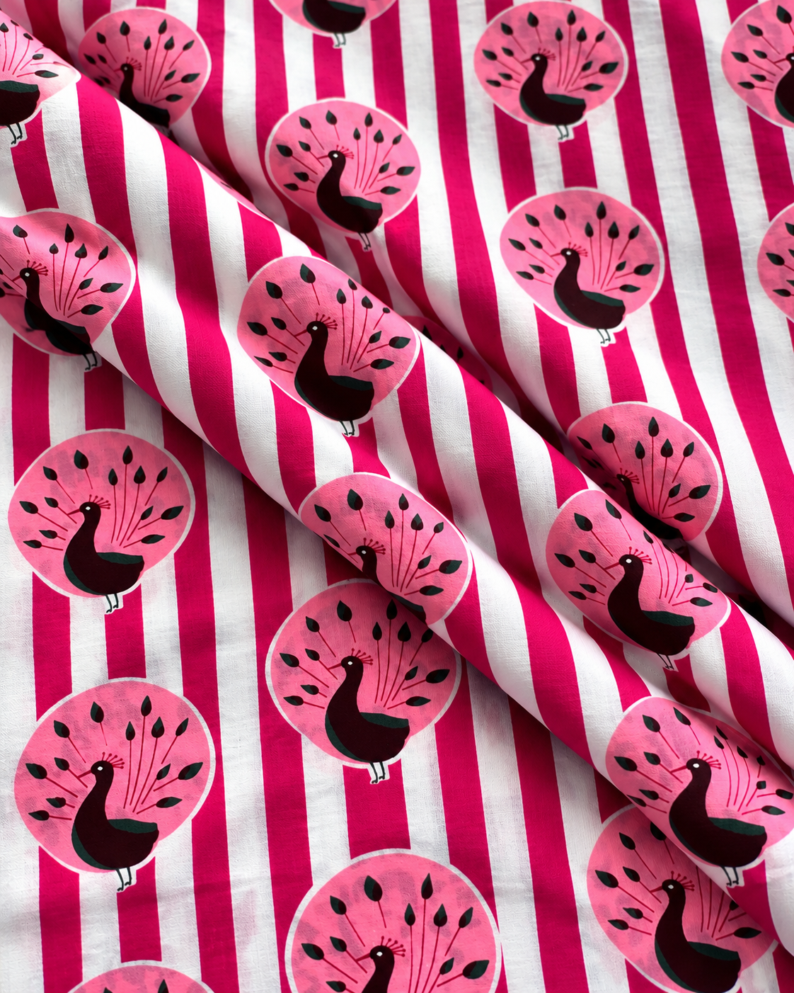 Pink bird print quilting cotton fabric with a bold striped background.
